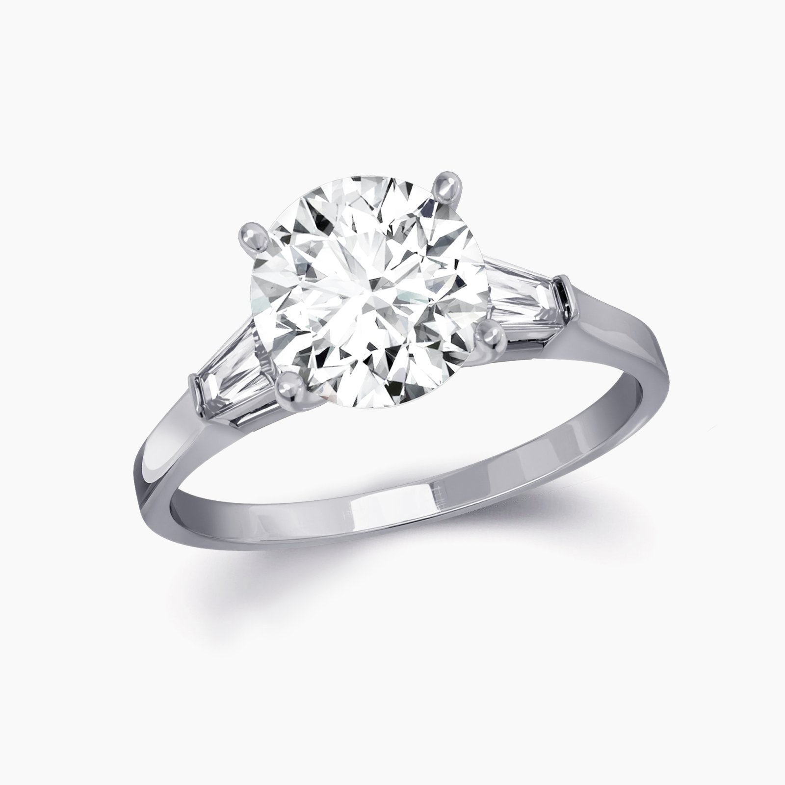 Our Bowery Setting is a three stone engagement ring shown here with a round brilliant diamond with two baguettes