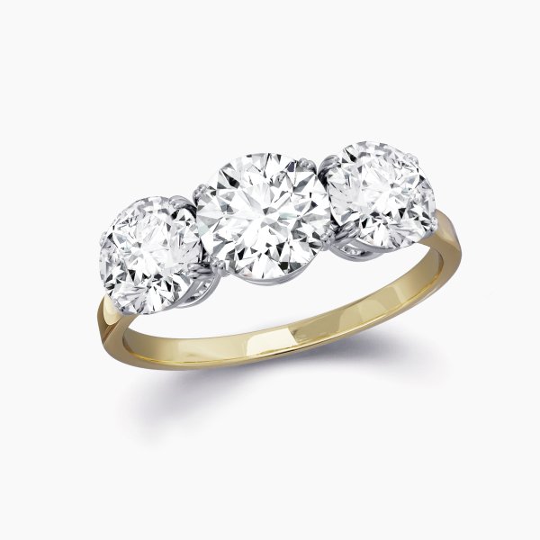 Our Chelsea Setting is a three stone engagement ring featuring three even round brilliant diamonds