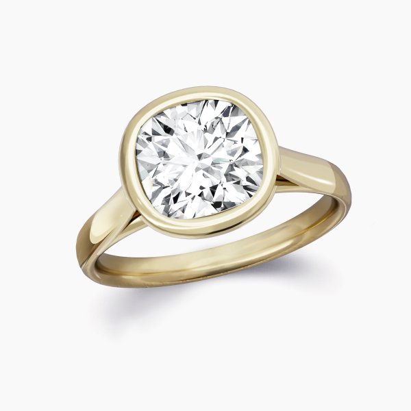 Above view of our Esmee Setting , A Cushion Cut Engagement Ring featuring a rubover setting.