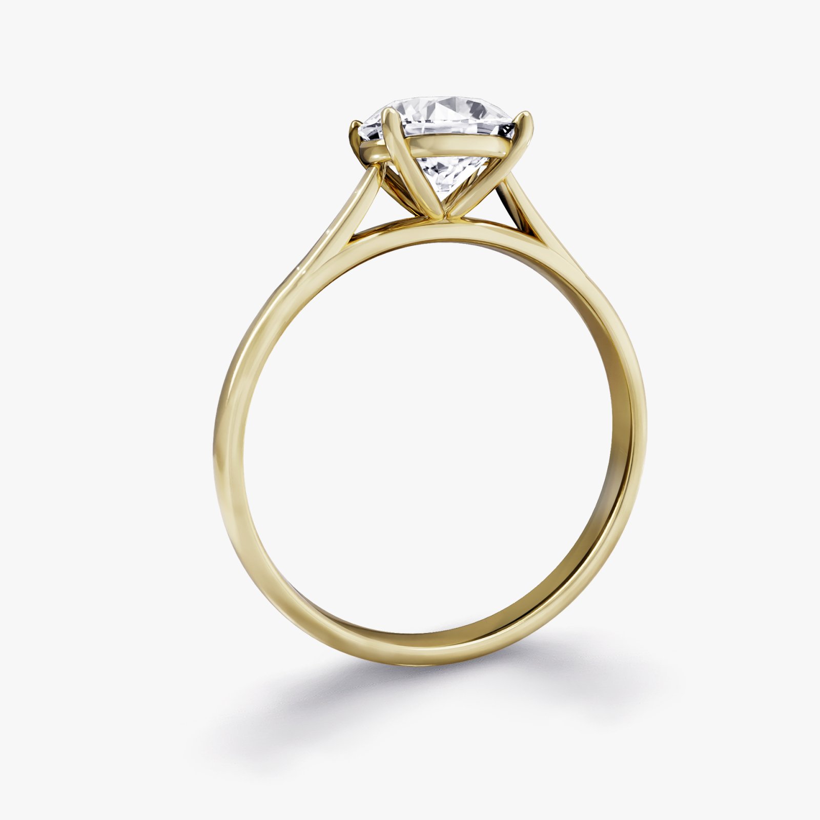 Side view of our Maiden Setting, A Diamond Solitaire Engagement Ring Featuring A Round Cut Diamond.