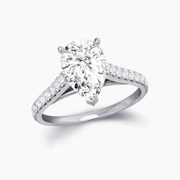 Our Rue Cler Setting is a diamond band solitaire engagement ring shown here with an pear cut diamond in platinum.