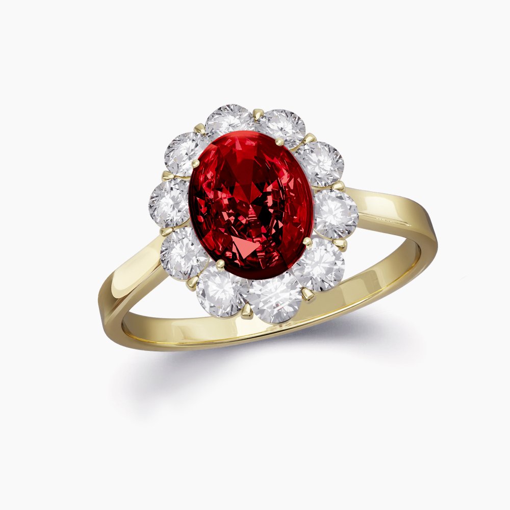 Our Fleur Setting is a halo engagement shown here with an oval cut ruby