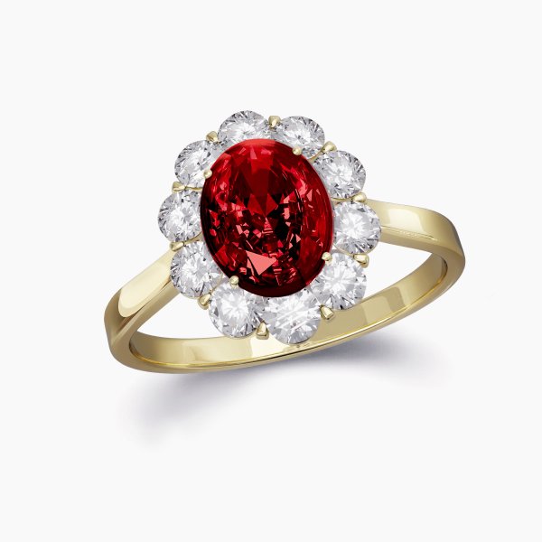 Our Fleur Setting is a halo engagement shown here with an oval cut ruby
