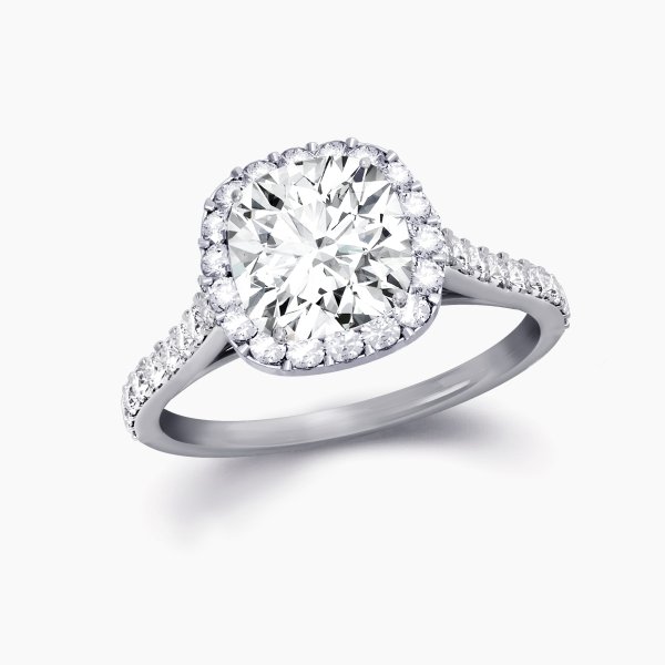Our Maiden Setting is a Halo Engagement Ring shown here with a cushion cut diamond